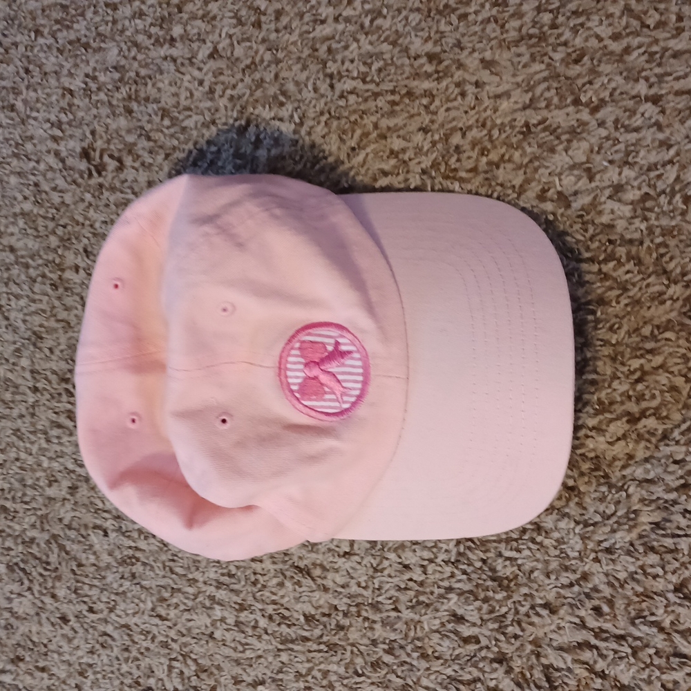 Light pink baseball cap with embroidered bow on front